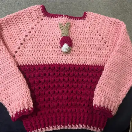 Pink and raspberry child's jumper with a bunny on the front
